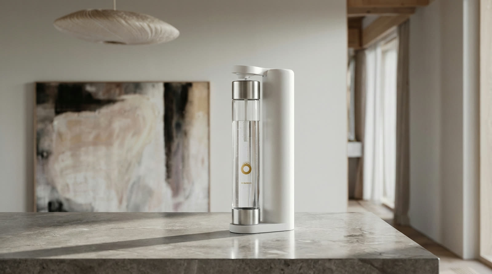 An OH Bubbles sparkling water maker on a stone kitchen bench